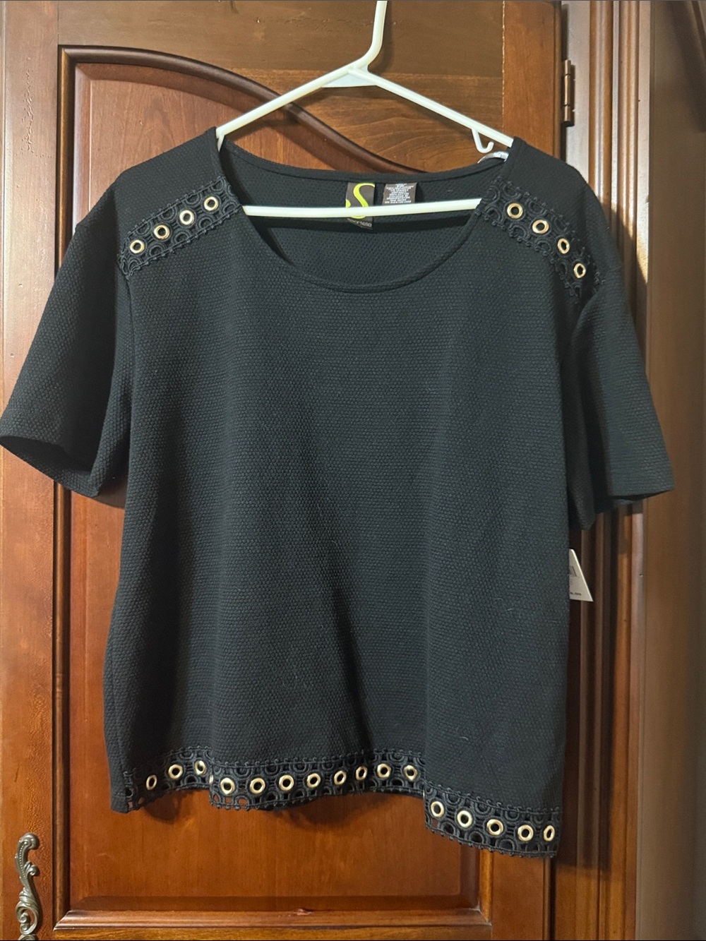 Sportelle Black Short-Sleeve Top with Eyelet Trim and gold grommets Size PM